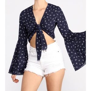 Crop top blouse with flared sleeves